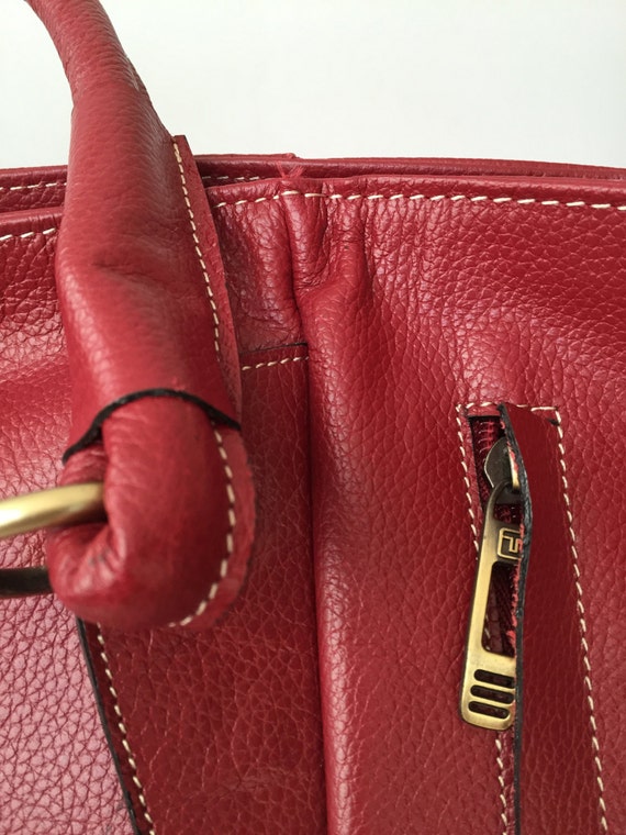 red leather pocketbooks