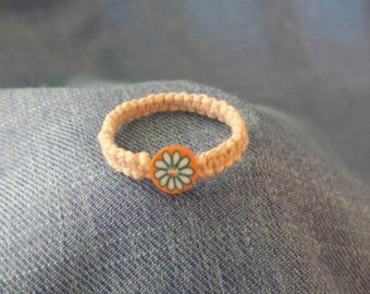 Orange and blue/white flowered hemp ring