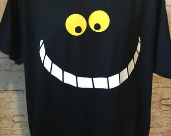 Alice Cheshire Cat grinning face inspired shirt