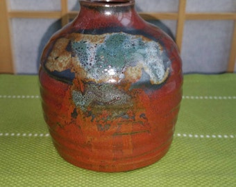 Sake bottle in orange brown