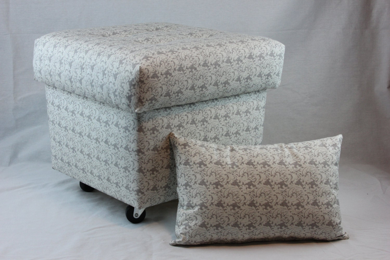 Foot stool with storage on wheels