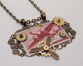 Steampunk . Steampunk pendant.Stamp pendant.Aviation pendant.