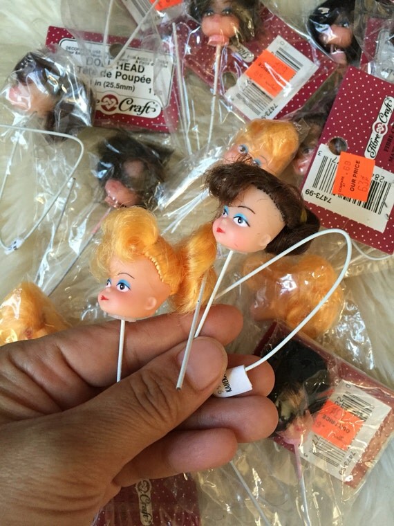 vintage set of 19 small plastic doll head / doll making