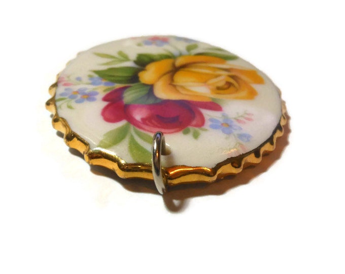 FREE SHIPPING Hand painted floral pendant, yellow and red roses on ceramic oval framed in gold painted scallops, signed Mela or Meta