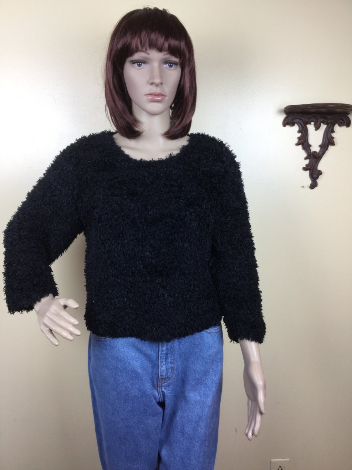 black shaggy jumper