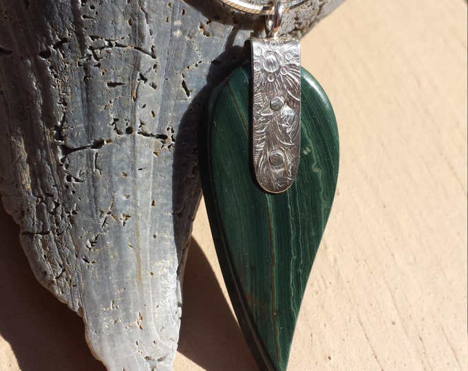 Petrified bog wood and sterling silver pendant