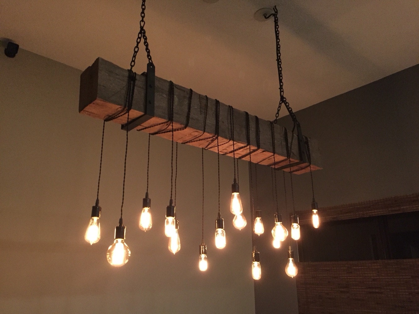Reclaimed barn beam light fixture. 6' long beam by 7MWoodworking