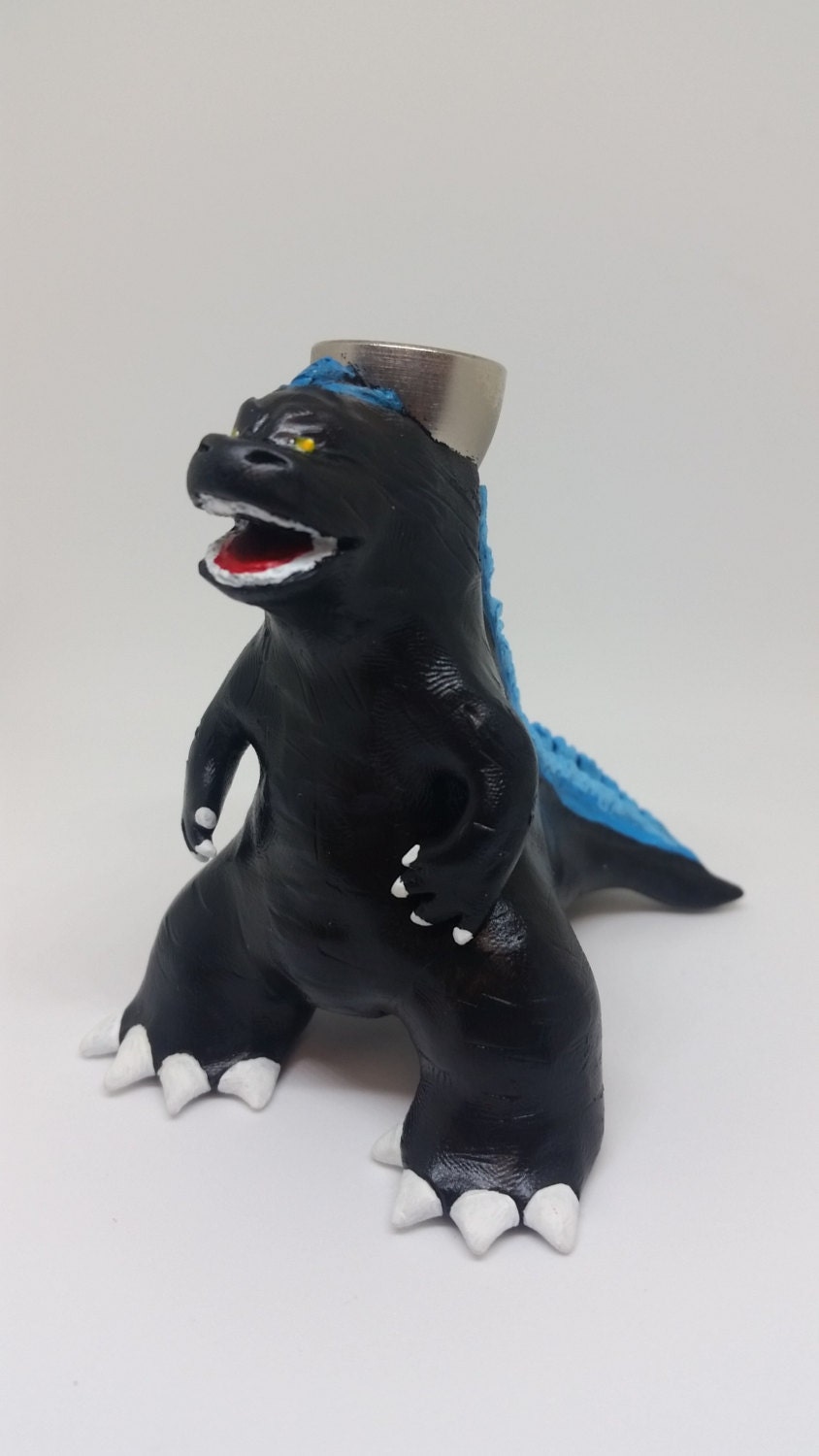 smoking godzilla toy