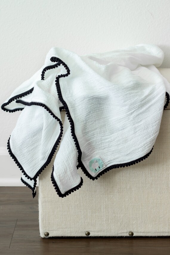 Black and White Pom Pom Swaddle Blanket White with Black