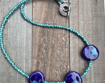 Handmade Teal and cobalt Kazuri beaded 20" necklace with oxidized silver toggle clasp