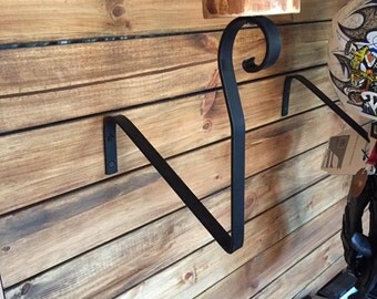 Motorcycle helmet holder, jacket holder, wall mount
