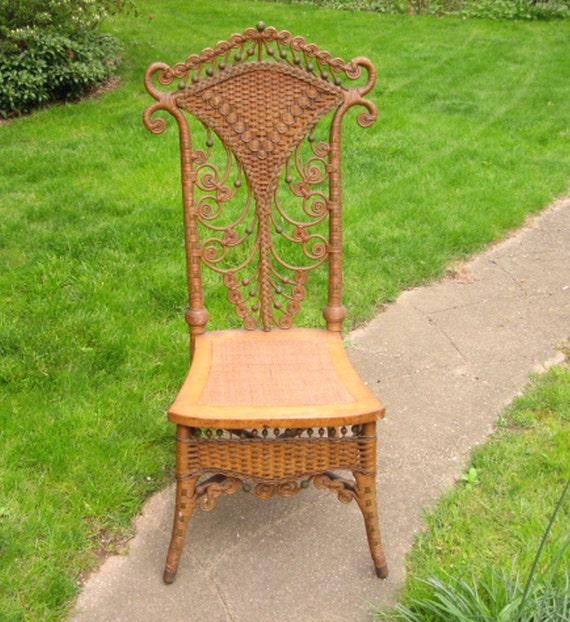 antique wicker high back curlicue photographer's chair