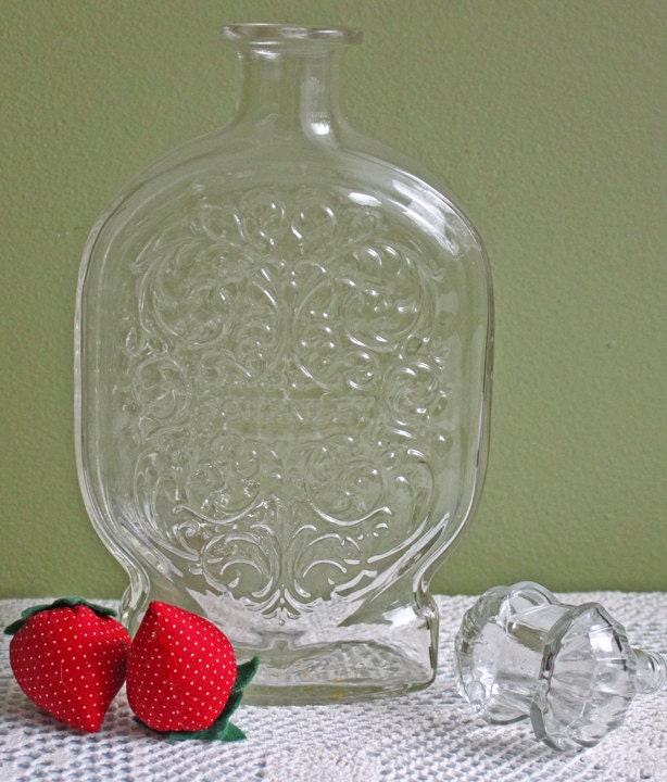 Download Vintage Bottle. Vintage Clear Glass Bottle with Embossed