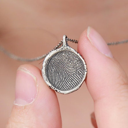 jewelry necklace finger