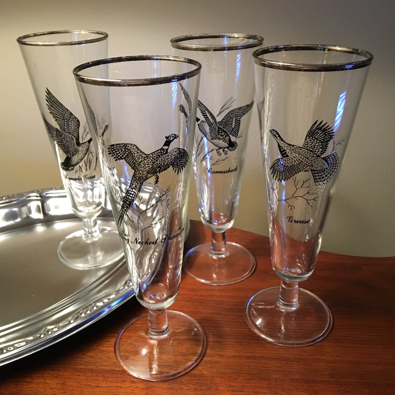 Four vintage Canada goose tall footed glasses by