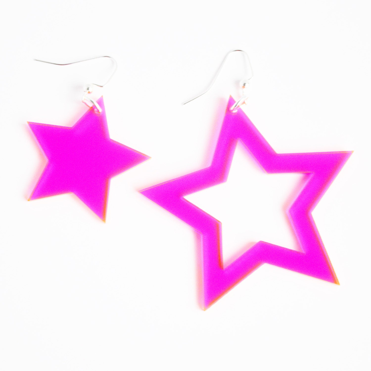 Bright neon pink laser cut acrylic asymmetric star cutout