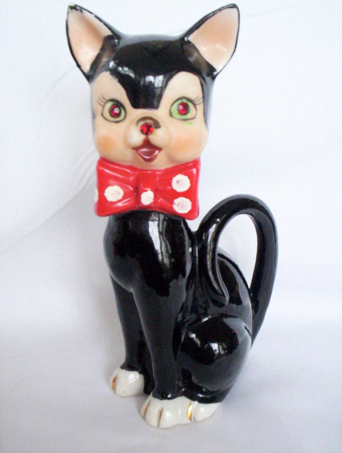 black and white cat figurines