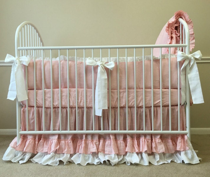 Pink Crib Bedding trimmed with white ruffle layered country