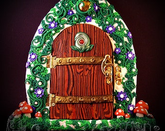 Fairy Door large, Handmade with Polymer Clay, with little glow in the dark mushrooms on a strong sturdy wooden base with a beautiful Latch
