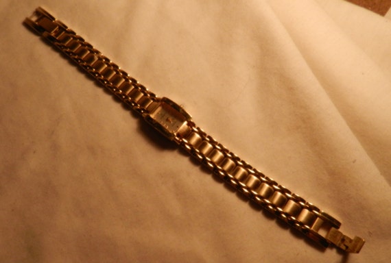 nice Gold-tone Liz Claiborne Quartz watch by UncommonArtSupplies
