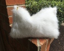 white faux fur purse