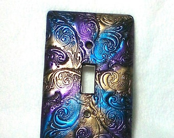 ON SALE was 10.95: Swirls and Curls metallic blue purple and bronze light switch cover