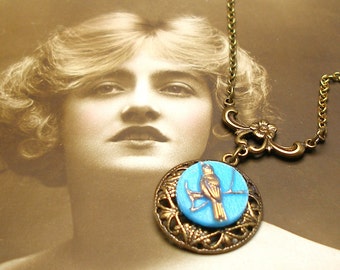 Wee BIRD BUTTON necklace, Vintage 40s glass on brass chain. Button jewellery.