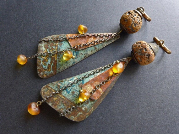 Igniparous.  Tin, amber and polymer earrings.