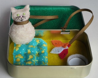 Traveling cat play set in felt with all items attached in Altoid tin with bed milk bowl and fish toy