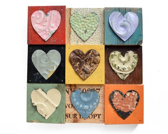 9 primitive hearts mixed media assemblage by Elizabeth Rosen
