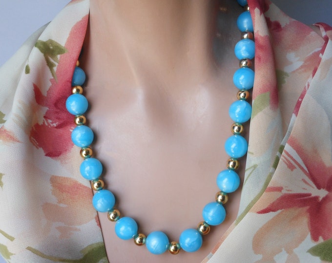 FREE SHIPPING 1950s blue lucite necklace, blue beads with light blue marbling interspersed with smaller gold beads for a lovely retro effect