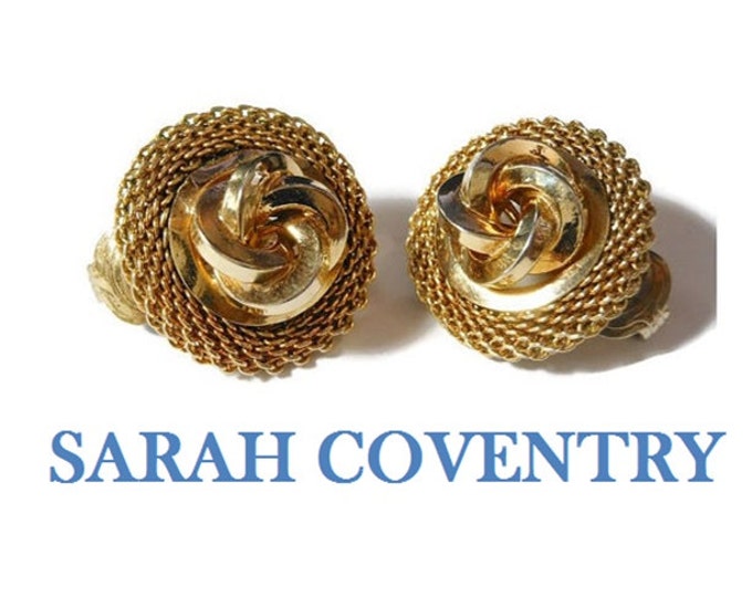 Sarah Coventry earrings 1960s gold tone 'love knot' earrings, surrounded by a frame of mesh, clip earrings