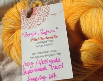 Hand Dyed superwash Sock yarn in Bright Safron