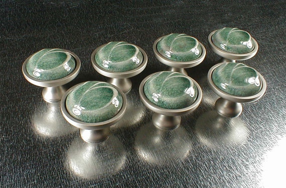 Cabinet knobs in light green translucent crackle glaze