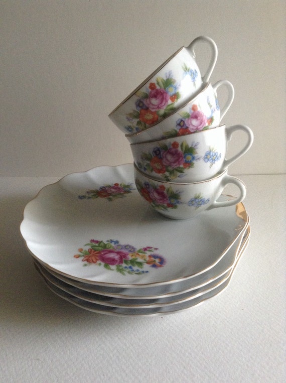 Vintage Set Of Four Floral Design Tea Cup and plate sets