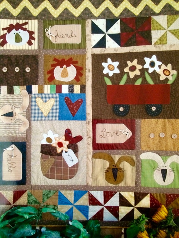 raggedy-ann-country-quilt-pattern-with-bunnies-and-flowers