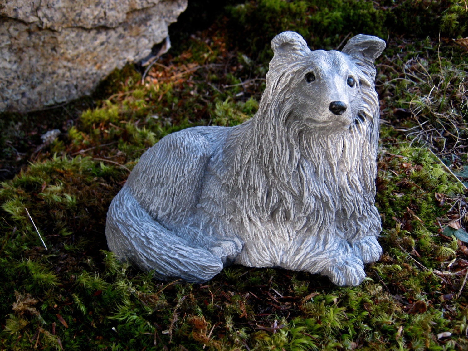 concrete sheltie dog statue