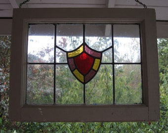 Vintage Stained Glass Window with Center Sheild Design in Pebbled Glass