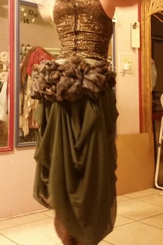 This Steampunk Bustle skirt is a belt, with a bustle and a "drape" or "train" attached to it in coordinating color(s). Custom made to order. by SeshatCostumier steampunk buy now online