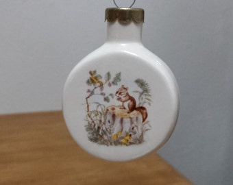 Ceramic Glazed Squirrel Ornament -(#806B) Fired Decal of Squirrel sitting on a stump on both side of the Ornament