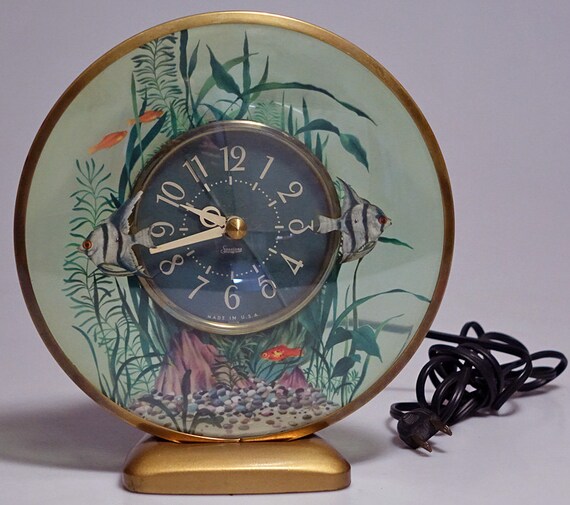 Items similar to Aquarius Electric Clock Fish Clock Sessions Clock