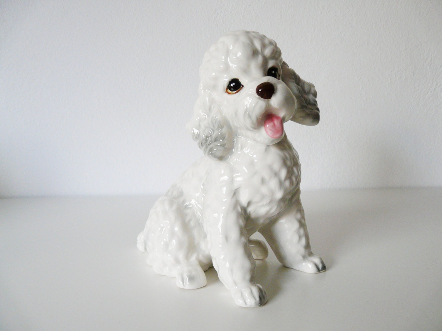 white ceramic poodle