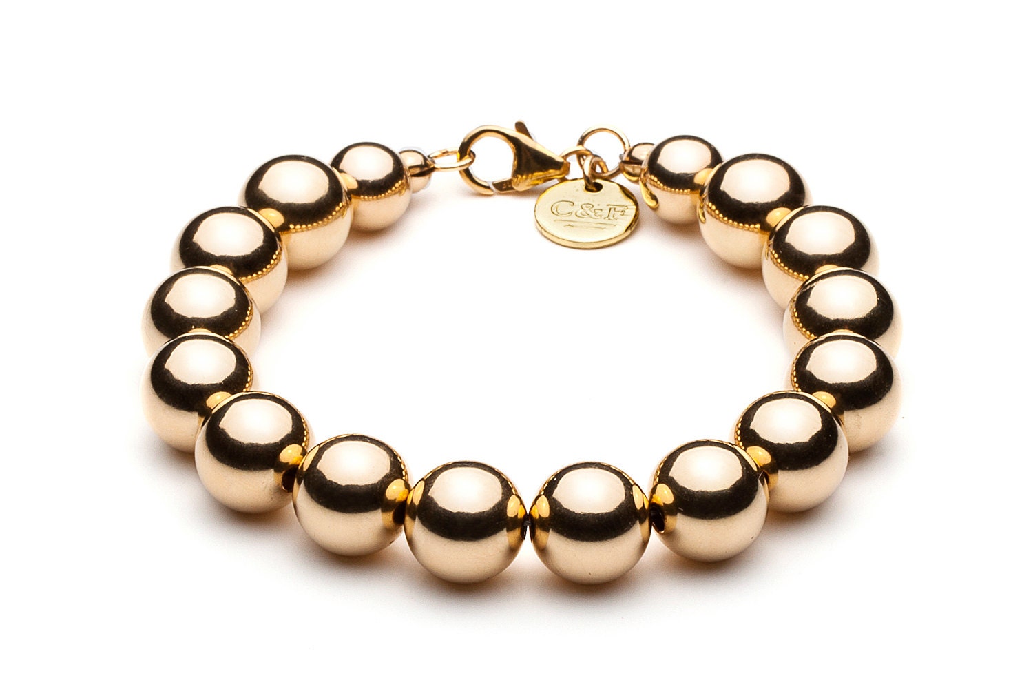Ball bracelet 10 mm gold