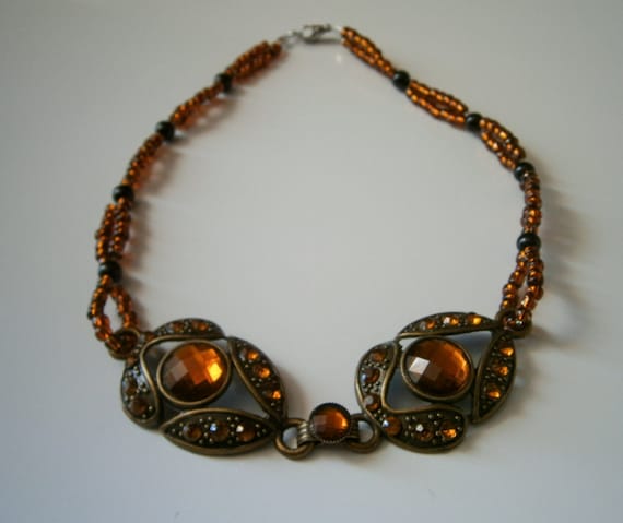 Beaded Necklace: Double Standed Brown Topaz Beaded Necklace with Bronze Colored Metal Pendant