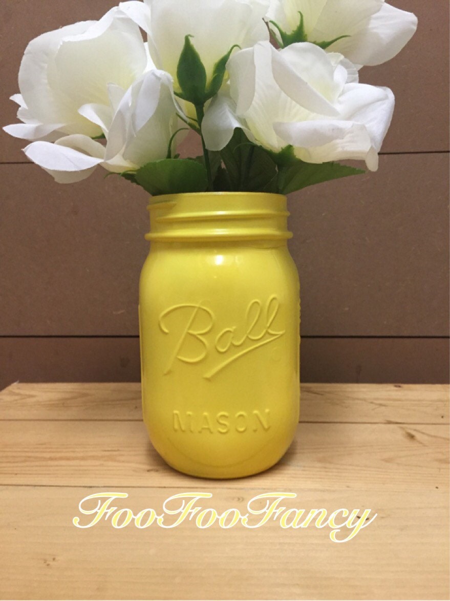 Bright yellow mason jar