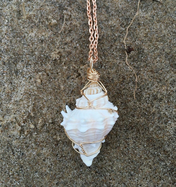 Wire wrapped shell necklace by SaltoftheEarthGoods on Etsy