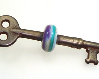 Handmade Lampwork Glass Bead - Beaded skeleton key. Purple & teal stripes on vanilla cream. Vintage, steampunk, jewelry necklace pendant.