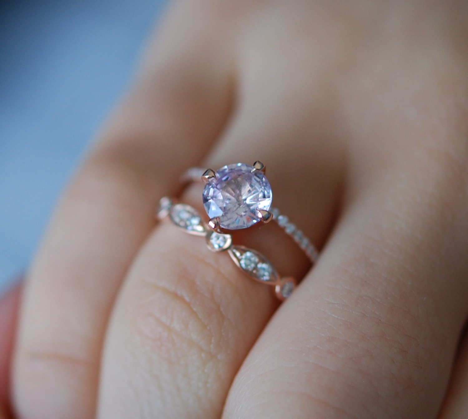 Rose gold engagement ring. Round blush sapphire diamond