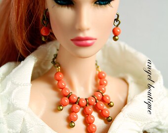 Collar Necklace Dangling with Orange Swarovski Pearl. Set Completes with Matching Earrings.