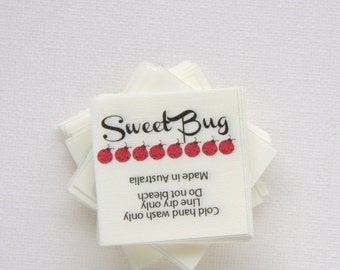 140 -1.5" x 1.5" - Fabric labels. In-seam fold style sewing label.